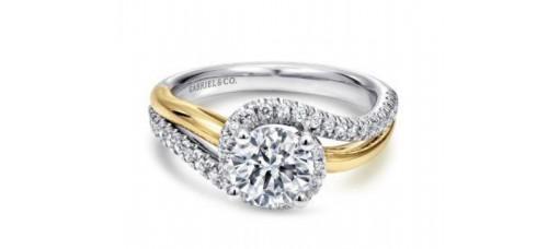 A mixed metal engagement ring from Gabriel and Co., available at Thom Duma Fine Jewelers.