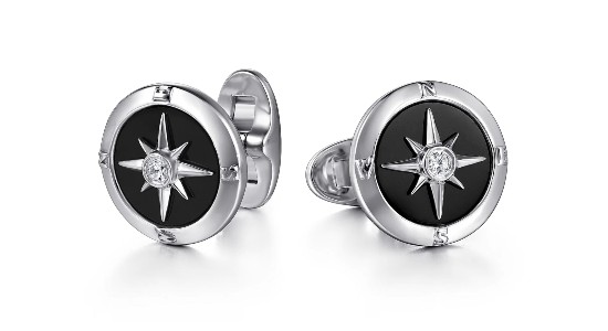 A pair of Gabriel & Co. cuff links with black onyx and diamond accents, available at Thom Duma Fine Jewelers.