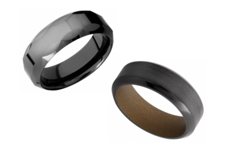 Two elegant black wedding bands by designers Gabriel & Co and Lashbrook, available at Thom Duma Fine Jewelers.